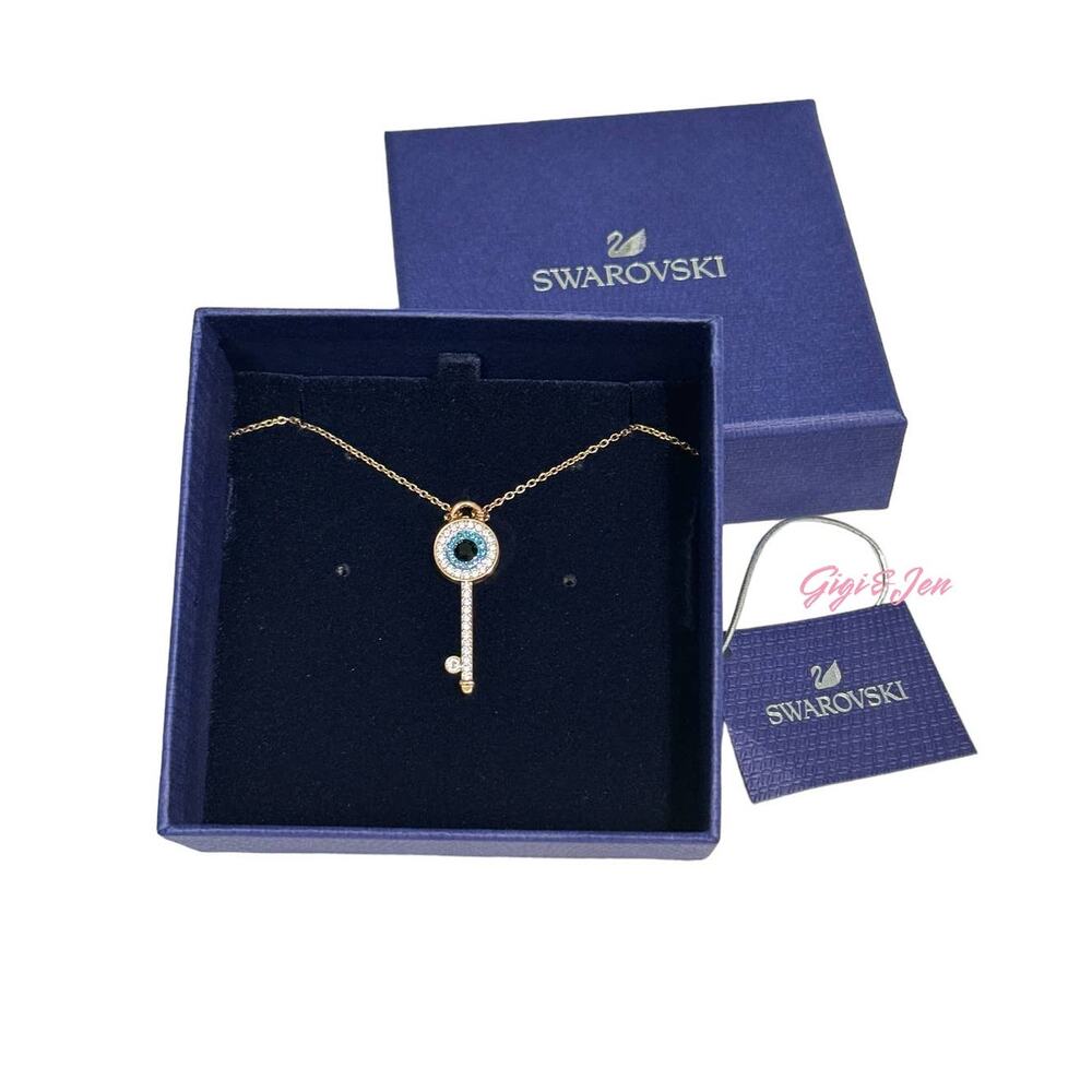 Swarovski Symbolic pendant Evil eye and key, Blue, Rose gold-tone plated